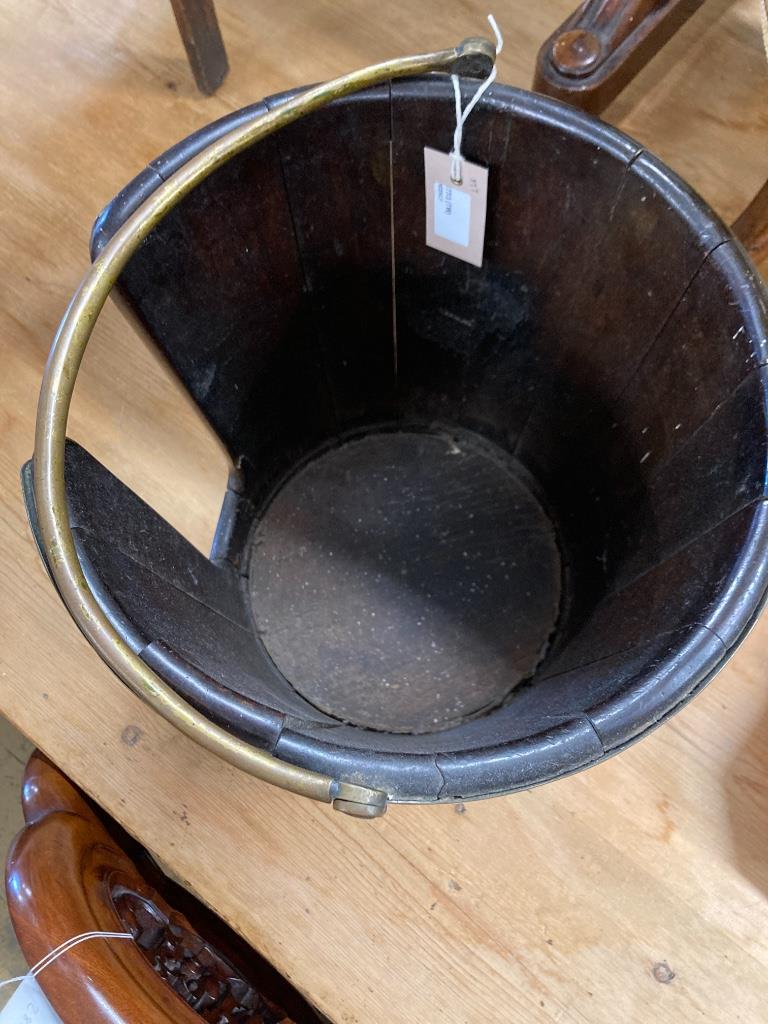 A George III brass bound staved mahogany plate bucket, 33cm diameter, height 33cm